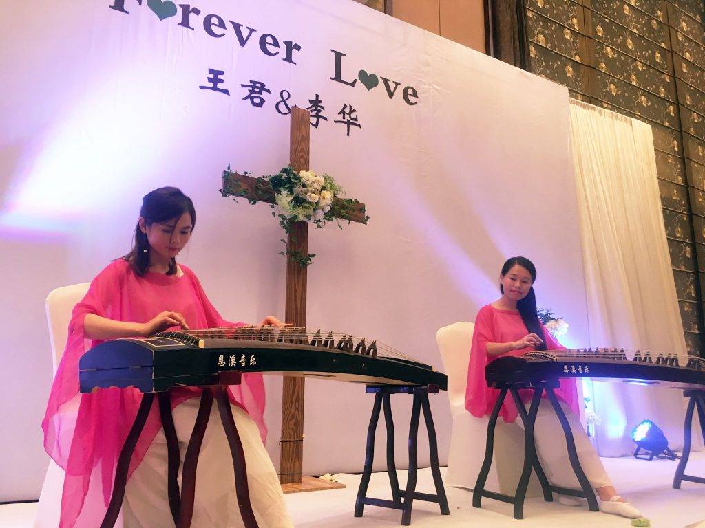 students perform at wedding